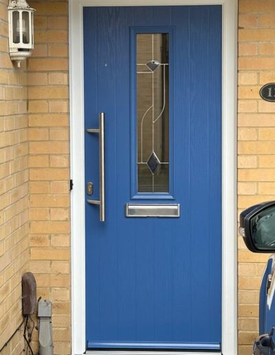 Distinction Door in Distant Blue with 600mm bar handle with custom glass