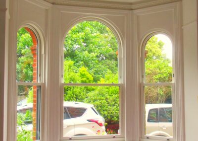 Ultimate Rose curved sliding sash window bay